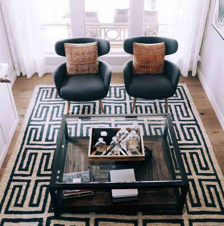 Patterned rug in a clean modern living room